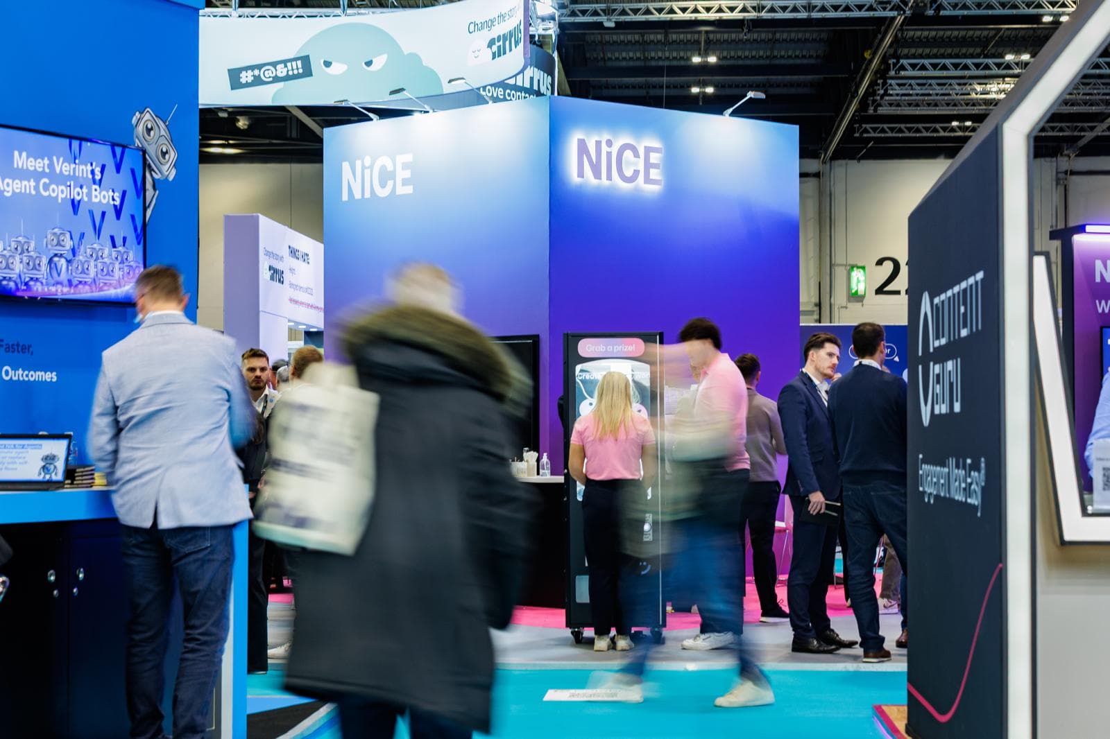 Visitors moving through the NICE exhibition stand.